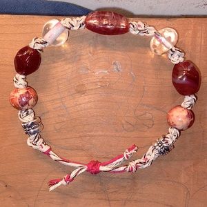 Hemp braided bracelet with glass, wood and metal beat beads